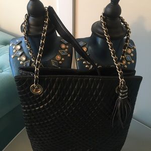Magnum black handbag